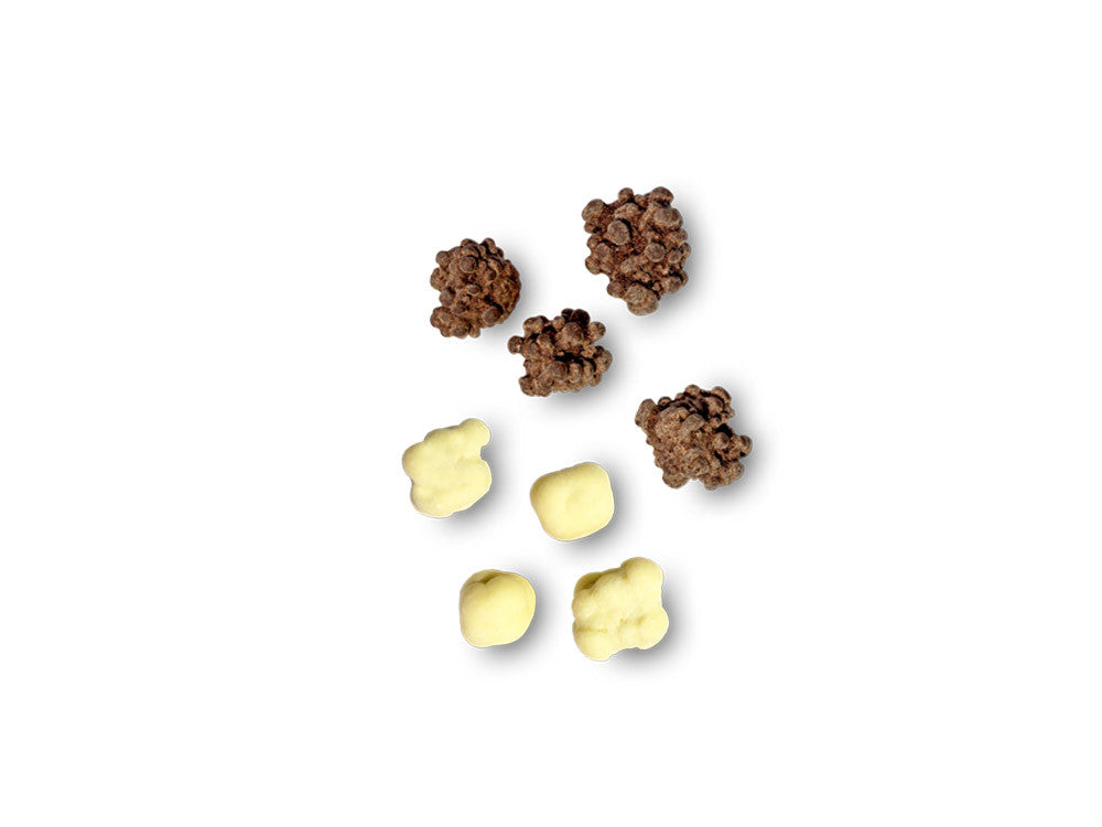 Quadrelli di fichi ricoperti di cioccolato bianco ed extra fondente | Pistì